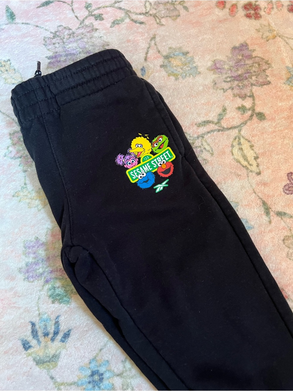 Reebok Black Kids Joggers with Colorful Sesame Street Patch
